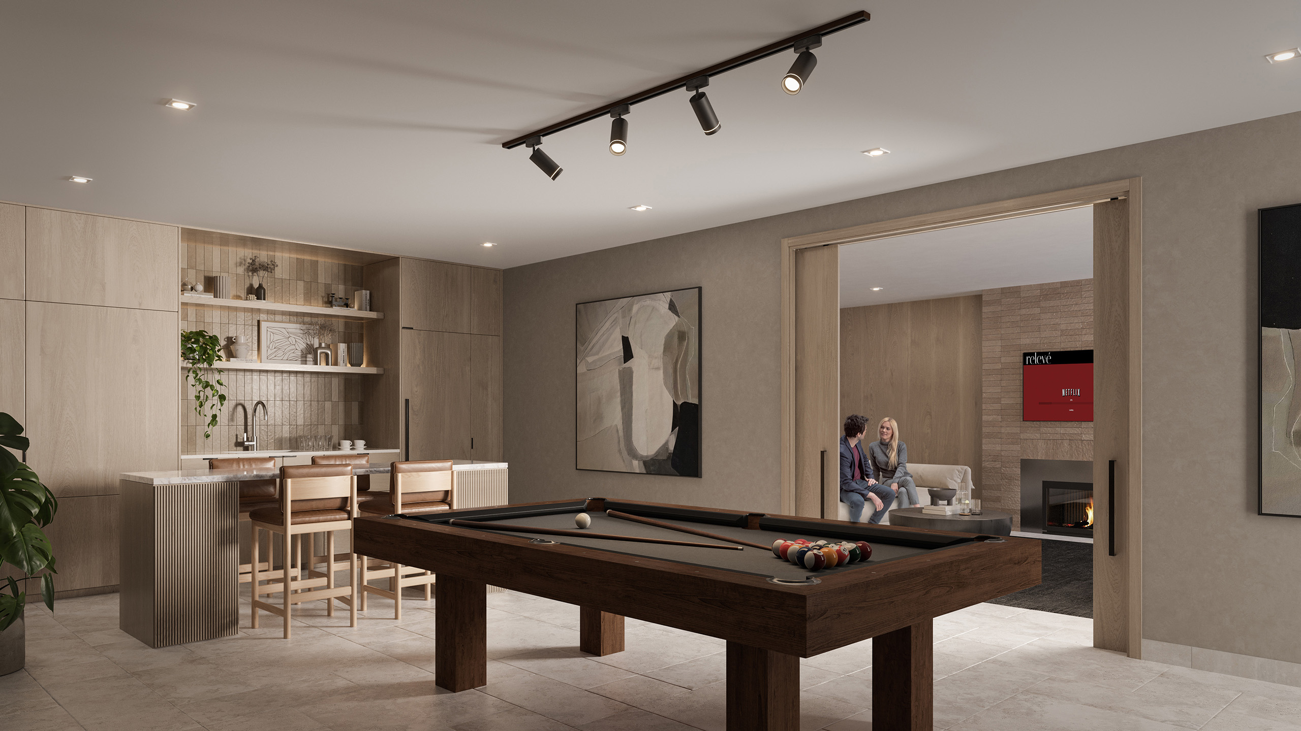 A pool table in the Relevé Common Area, showcasing a stylish modern living room with contemporary decor.